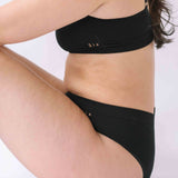 Woman wearing the Six Ada seamless ribbed nursing bra and high waisted knicker. Comfortable and supportive and suitable for pregnancy and breastfeeding.