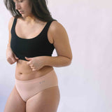 Woman wearing Black Six Ada seamless Bralette and deep knickers, Supportive and comfortable underwear for pregnancy, maternity, breastfeeding and  yoga